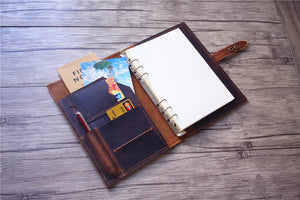 brown leather notebook journal